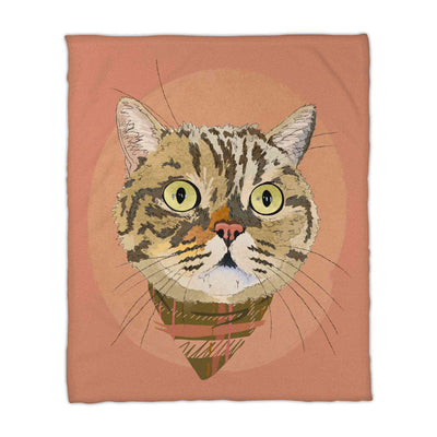A fleece blanket featuring a custom illustrated cat portrait of a tabby cat wearing a plaid bandana set against a subtle textured orange circular background printed on the blanket, shown on a clean white background. 